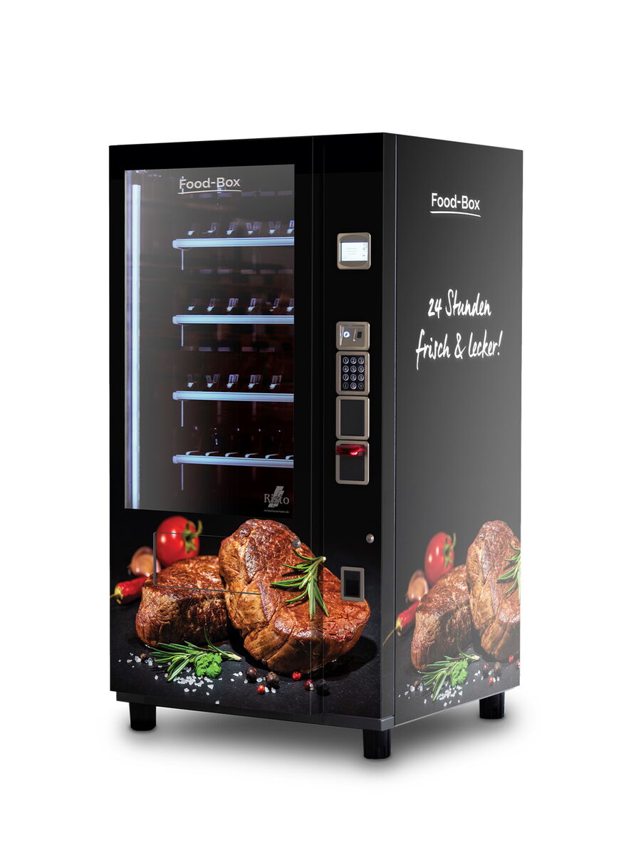 Distributeur automatique au design noir illustrant des steaks      