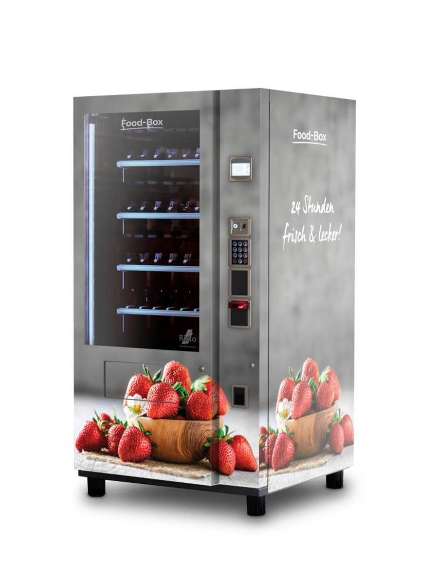 Distributeur automatique au design gris illustrant des fraises      