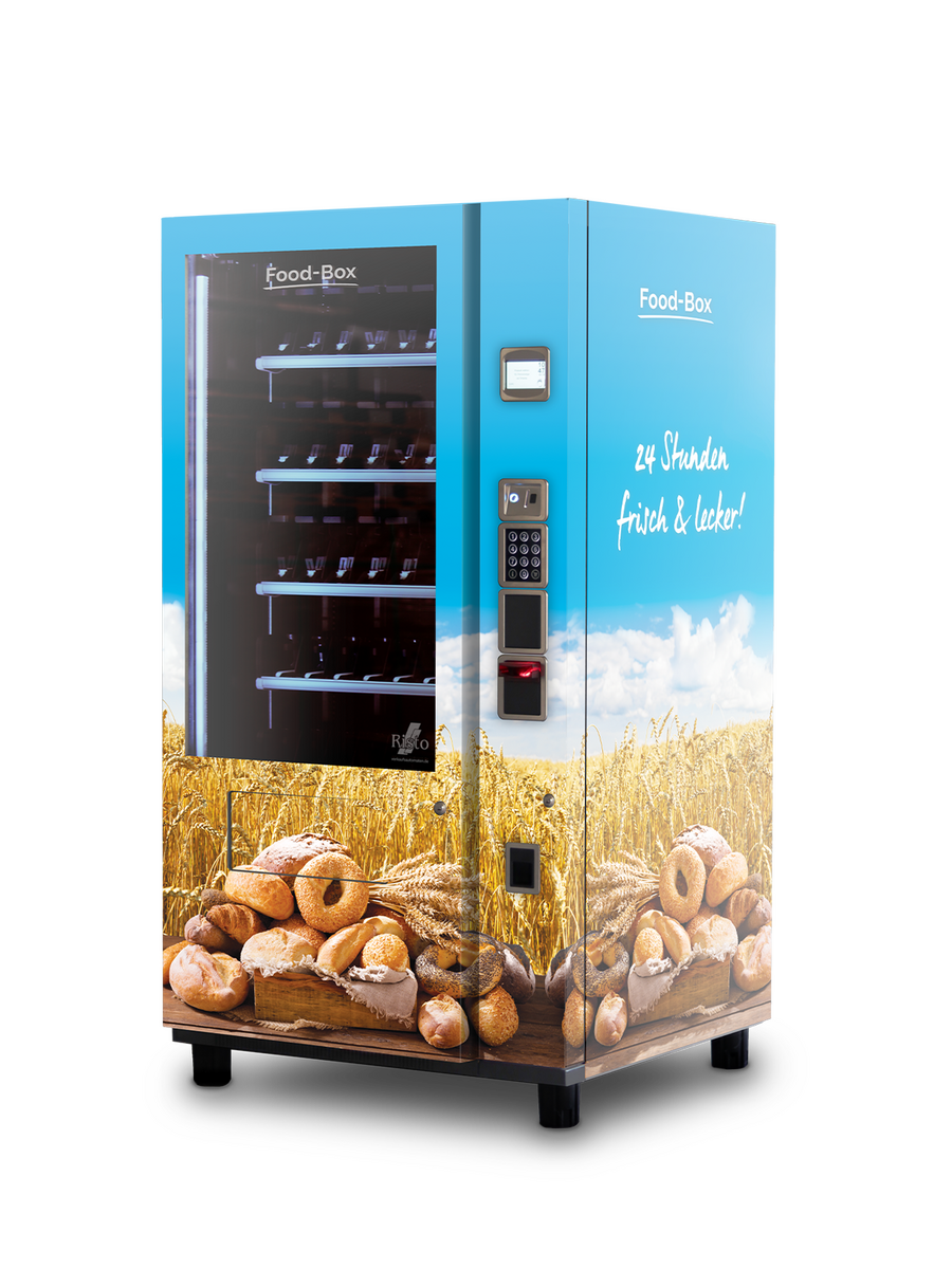Distributeur automatique avec pain, petits pains et champ de blé en arrière-plan      